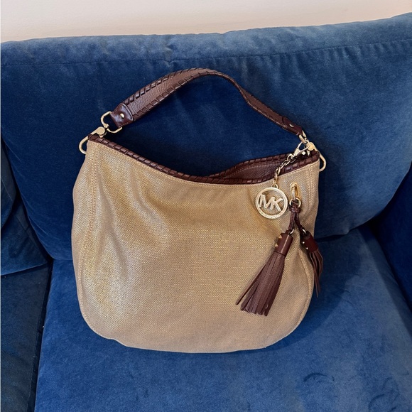 Michael Michael Kors Metalic
Fabric‎ & Leather trim hobo bag - Picture 1 of 6